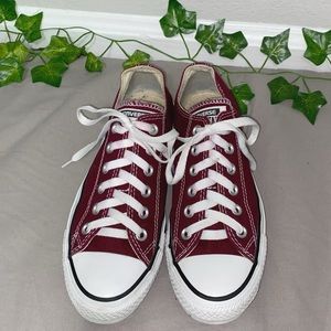 Burgundy Converse low tops